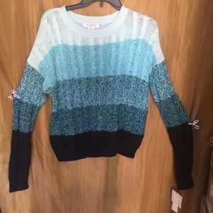 Blue knitted sweater